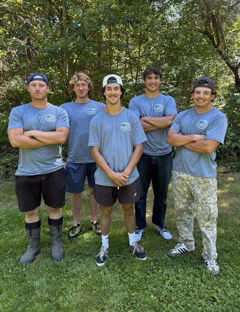 The Island Moss Busters crew on Vancouver Island